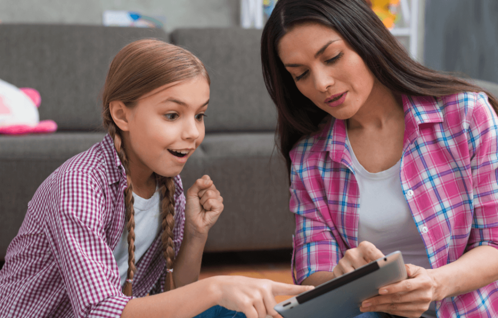 A parent helping their child with a back to school plan for ADHD
